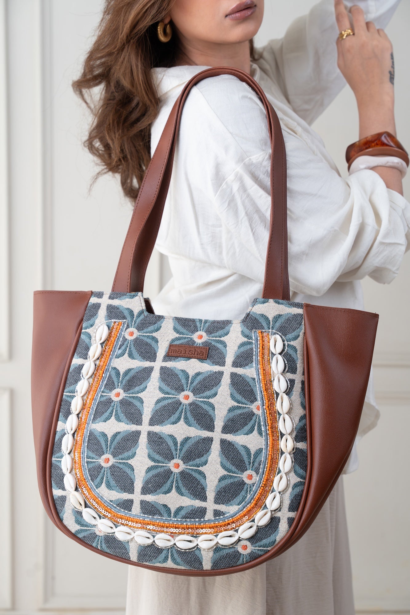 Azure Bloom Crescent Handbag